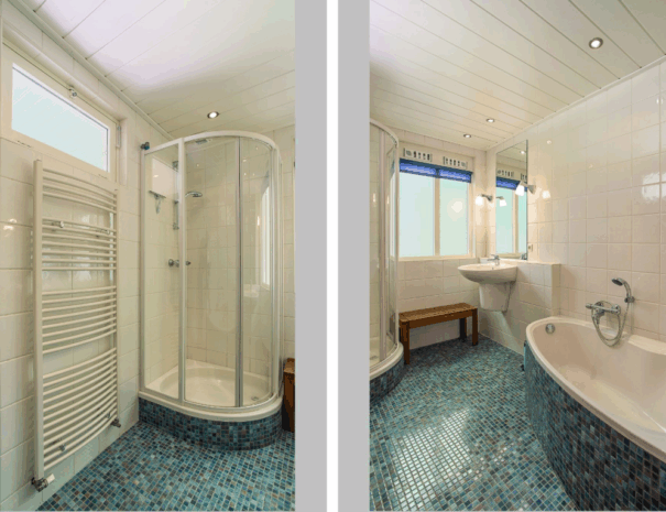 Badkamer met douche en ligbad